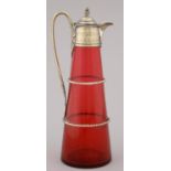 A VICTORIAN EPNS MOUNTED CRANBERRY GLASS CLARET JUG, C1900, 30CM H Plating worn showing nickel and