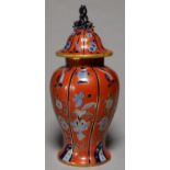 A MASON'S TYPE  RED GROUND EARTHENWARE VASE AND COVER, C1840, OF INVERTED BALUSTER SHAPE, THE