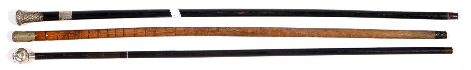 ONE BAMBOO AND TWO EBONY WALKING CANES, EACH WITH SILVER OR OTHER POMMEL, TWO MILITARY (ROYAL - Image 2 of 2