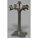 A GERMAN JUGENDSTIL PEWTER CANDLEABRUM, C1910, OF FIVE LIGHTS AND ORGANIC FORM, THE FOOT DECORATED