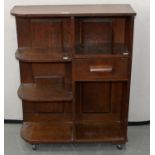 AN ART DECO OAK OPEN BOOKCASE, C1930, FITTED WITH A DRAWER, 88CM H; 23 X 69CM (ORIGINALLY PART OF