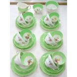 AN E. BRAIN AND CO FOLEY CHINA APPLE GREEN GROUND TEA SERVICE, 1930'S, PRINTED AND PAINTED WITH A
