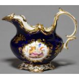 A FINE COALPORT COBALT GROUND CREAM JUG, C1835, PAINTED TO EITHER SIDE WITH A LOOSE BOUQUET
