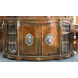 A VICTORIAN SERPENTINE GILT BRASS MOUNTED WALNUT AND FLORAL MARQUETRY SIDE CABINET, C1860, THE TOP