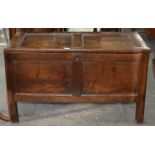 A GEORGE II JOINED OAK CHEST, FIRST HALF 18TH C, WITH TWIN PANEL LID AND FRONT, ON STILES, 62CM H;