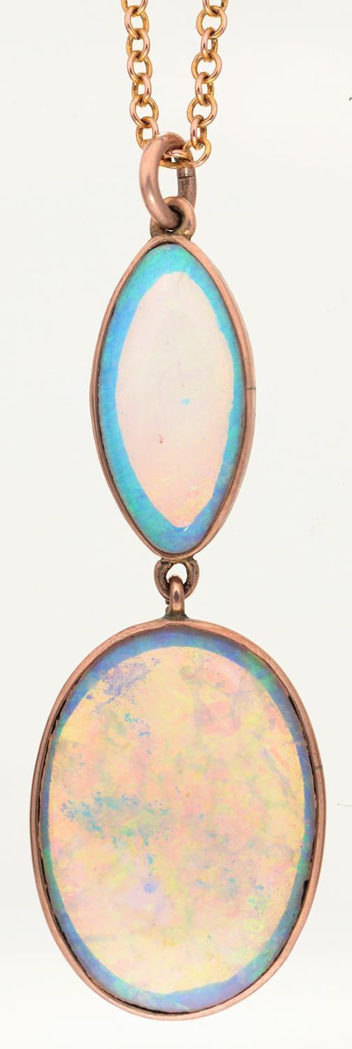 AN OPAL PENDANT, EARLY 20TH C, 36MM, MARKED  9C, 2G AND A NECKLET Good condition, the opals