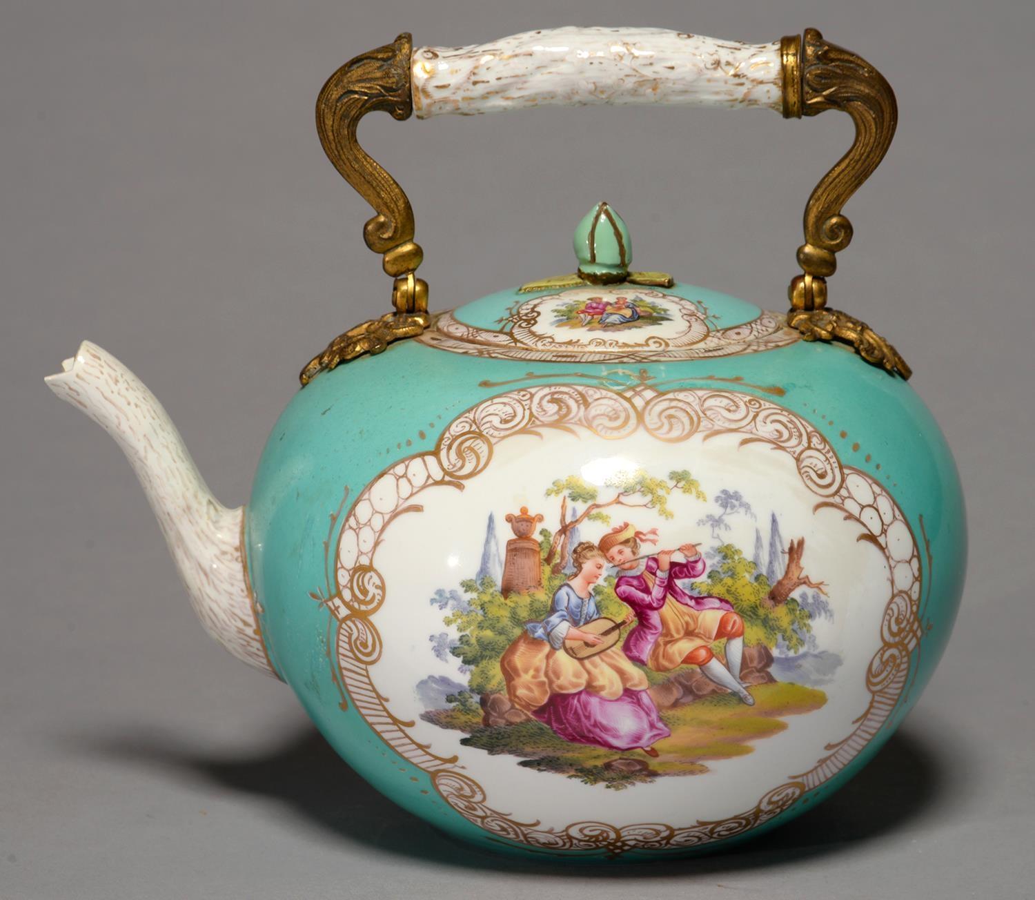 A MEISSEN TURQUOISE GROUND GLOBULAR TEA KETTLE AND COVER, LATE 19TH C, MOUNTED WITH ORMOLU SWING