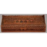 AN INDIAN SANDALWOOD GLOVE BOX, 19TH C, TYPICALLY CARVED WITH SCROLLING FOLIAGE, TIGERS AND OTHER