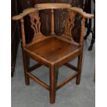 A GEORGE III OAK CORNER CHAIR, LATE 18TH C, WITH BOARDED SEAT Losses and old repair, joints loose