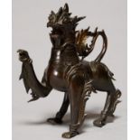 A SOUTH EAST ASIAN BRONZE AQUMANILE OF LION FORM, POSSIBLY 19TH C, THE HEAD FORMING THE COVER,