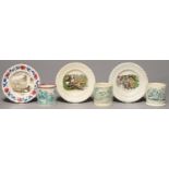 ONE AND A PAIR OF VICTORIAN MOULDED EARTHENWARE CHILDREN'S PLATES AND THREE CONTEMPORARY GREEN
