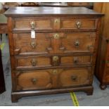 A GEOMETRIC MOULDED OAK CHEST OF DRAWERS IN WILLIAM AND MARY STYLE, EARLY 20TH C, WITH BRASS