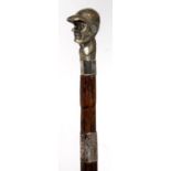 A BAMBOO WALKING CANE WITH AN EPNS JOCKEY'S HEAD POMMEL, LATE 19TH C, SILVER COLLAR, NICKEL PLATED