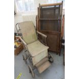 AN ALWIN STEEL, WOOD AND CANVAS WHEELCHAIR, C1920 AND A CANED SPIRAL TURNED OAK COT (2) Both in