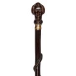A CARVED HARDWOOD ENTWINED SNAKE WALKING CANE, POSSIBLY PRISONER OF WAR, C1900 WITH AN UNUSUAL