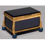 A MINIATURE CONTINENTAL GILT BRASS AND HARDSTONE CASKET, C1900, INSET WITH PANELS AND FEET OF BLUE