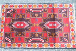 A natural dye hand made Afghan Baluchi rug,