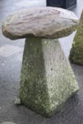 A pair of carved stone staddle stones,