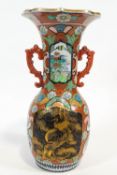 A large Japanese porcelain two handled vase,