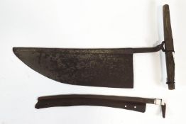 A Brades Mill cross handle hay knife, 78cm long and an Isaac of Nunney scythe blade,