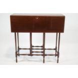 An Edwardian mahogany "spider leg" drop leaf table,