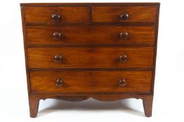 A 19th century mahogany chest of two short and three long drawers with turned handles