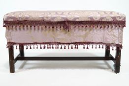 A mahogany upholstered combination ottoman stool of rectangular form on stretchered legs