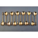 A cased set of twelve silver gilt Apostle type tea spoons, the Tichborne spoons,