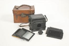A Marion and Co 'Soho' reflex folding camera, Kershaw patent, with spare plates,