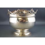 A small silver rose bowl, of bellied Monteith form with the usual crenellated rim,