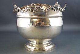 A small silver rose bowl, of bellied Monteith form with the usual crenellated rim,