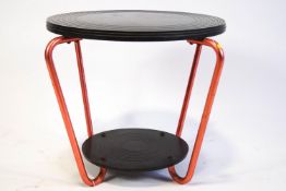 A Retro record coffee table, the circular top and base supported on a tubular metal frame,