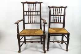 An elm and ash Lancashire open arm chair with turned spindle back, and rush seat,