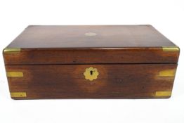 A 19th century rosewood and brass bound writing slope, lacking interior,