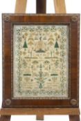 A mid 19th century unusual family sampler to celebrate the marriages of sisters,