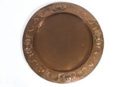 An Art Nouveau style copper tray stamped JS & SB,