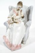 A Royal Worcester figure 'Hush-a-bye-Baby',