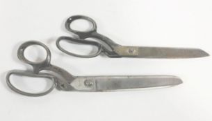 Two pairs of seamstress scissors, the largest by William Rogers Sheffield,