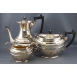 A silver French style four piece tea and coffee service, of oval form, with domed covers,