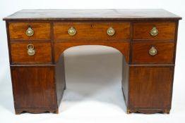 A 19th century mahogany sideboard with three drawers and a cellarette drawer,