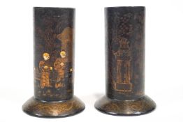 A pair of lacquer spill vases, of plain round form,