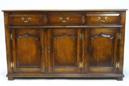 A 20th century oak dresser base, in George III style,