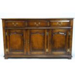 A 20th century oak dresser base, in George III style,