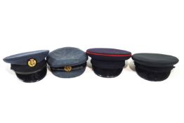 Four military caps, to include two RAF, one with a metal cap badge, the other embroidered,