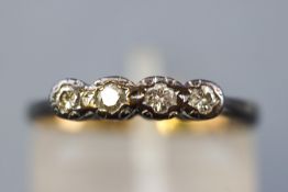 A collection of two rings to include an 18ct gold & platinum 9 stamped) fours stone diamond ring