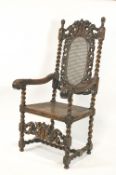 A Victorian carved Daniel Marot style chair, with caned seat and back,