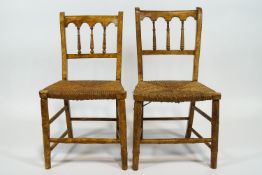 A pair of faux bamboo side chairs with scumbled finish and woven rush seats with bobbin turned back