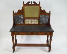 A 19th century pitch pine wash stand with decorative shaped back with broken pediment