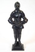 An iron knight figure fireside companion, painted black,