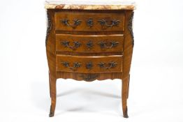 A marble topped French style unit with three drawers and gilt mounts,